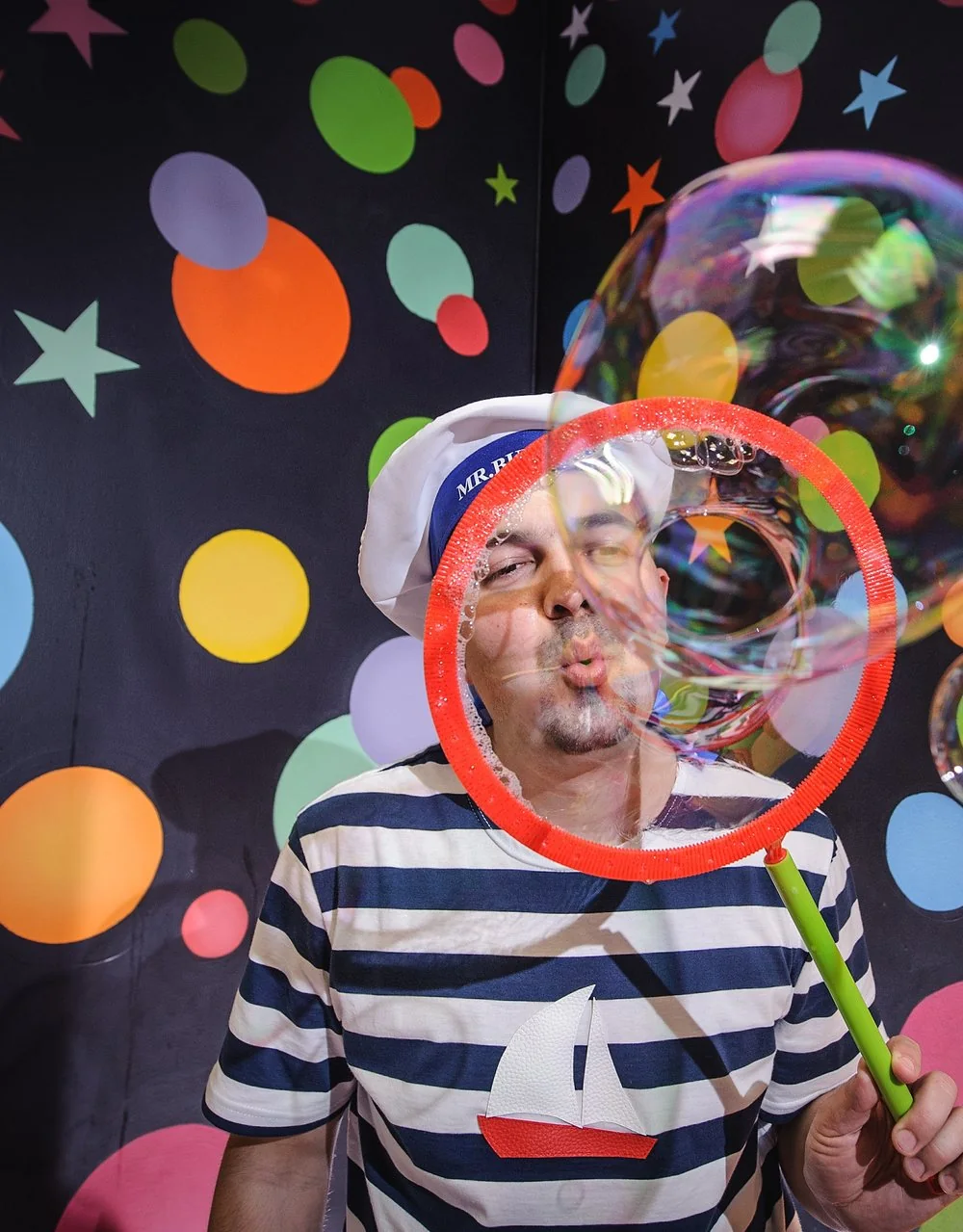 Mr. Bubble performing a bubble show with a giant bubble